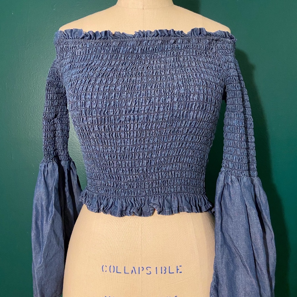 Smocked long sleeve top